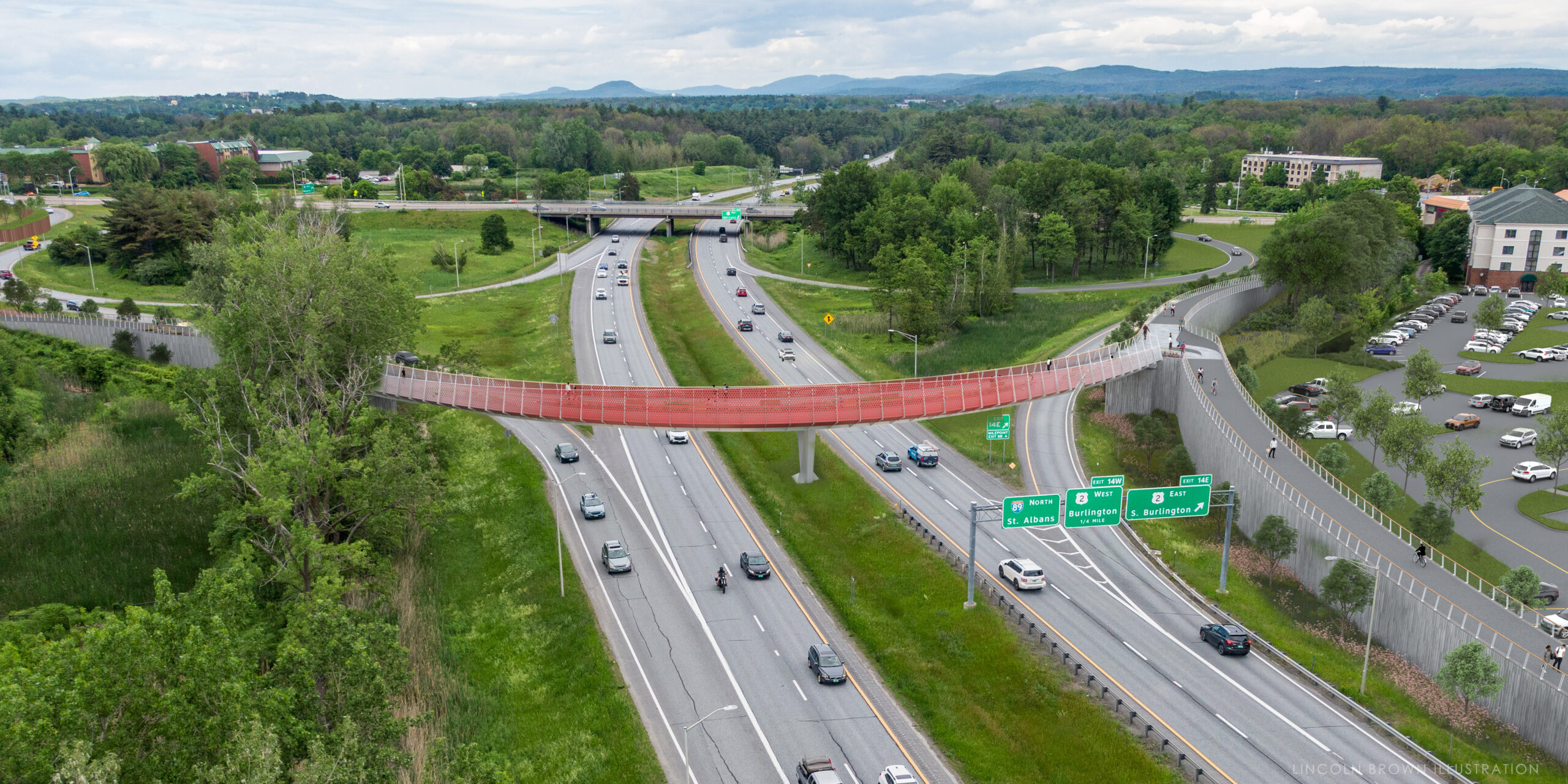 an aerial view of a highway with a red bridge over it